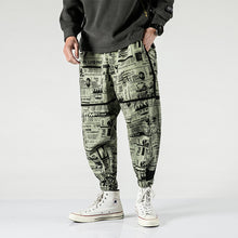 Load image into Gallery viewer, Tide brand hip hop newspaper pants men and women pants ins the same paragraph street loose beam pants national tide