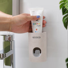 Load image into Gallery viewer, Automatic Toothpaste Dispenser Dust-proof Toothbrush Holder Wall Mount Stand Bathroom Accessories Set Toothpaste Squeezers Tooth