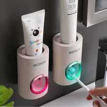 Load image into Gallery viewer, Automatic Toothpaste Dispenser Dust-proof Toothbrush Holder Wall Mount Stand Bathroom Accessories Set Toothpaste Squeezers Tooth
